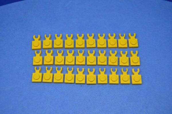 LEGO 30 x Halter gelb Yellow Plate Modified 1x1 with Clip Vertical 4085